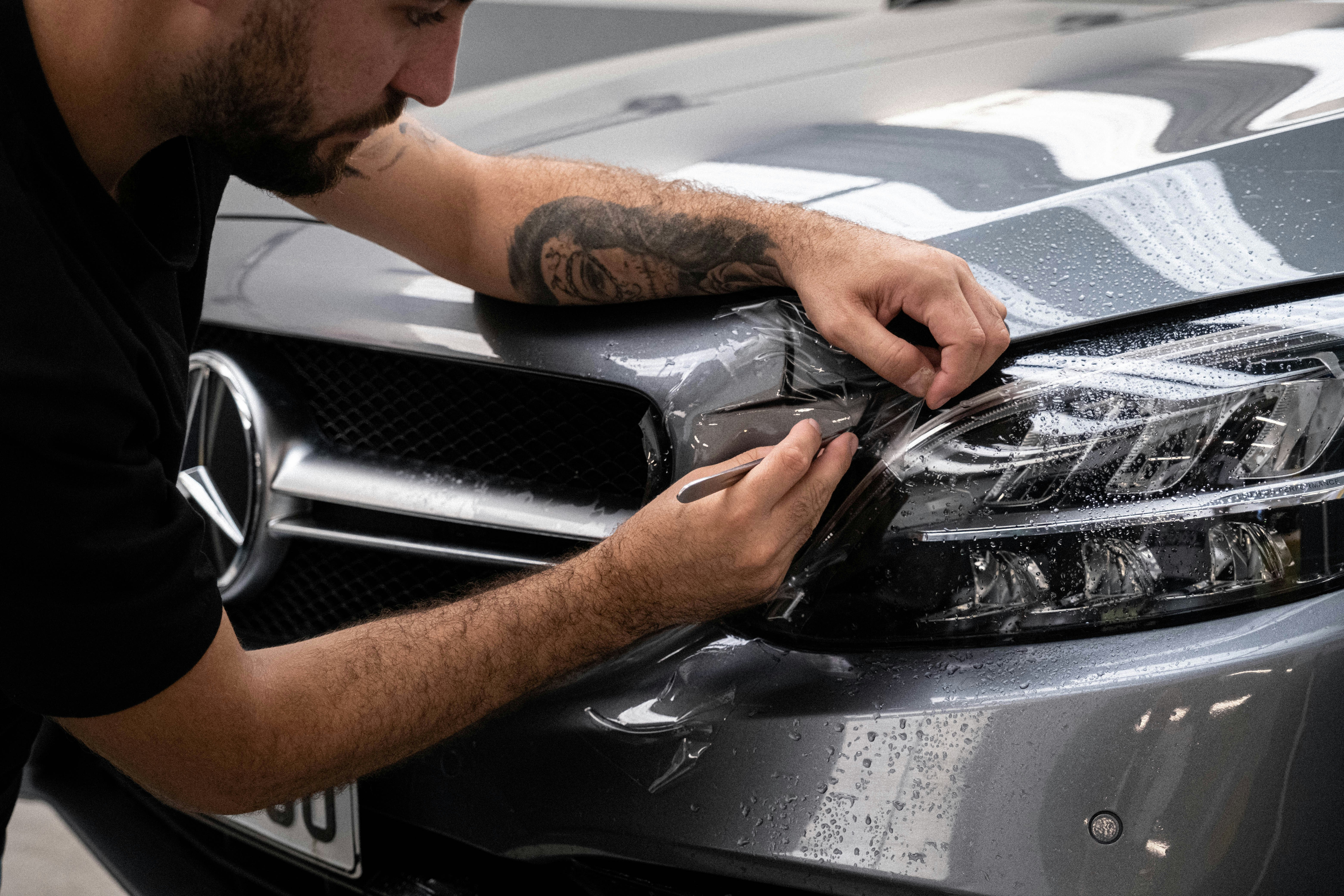 Car wrapping with foil drying with fan